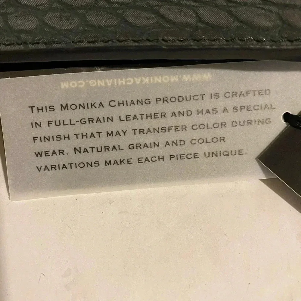 Monika Chiang NWT neroshsi leather clutch bag